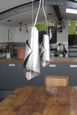 Task lighting can easily become one of the most important features in planning your lighting design. Key tasks in the kitchen include food preparation, cooking and cleanup, while at other times it's a place for homework, household business and family meals. Sleek modern pendant light and lighting design.